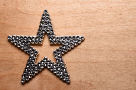 Fashion star on a wooden backgroundの写真素材