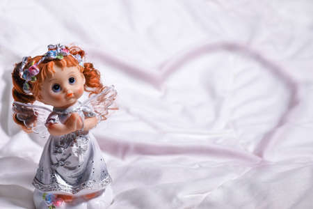 Heart of an angel of love and happiness on St. Valentine's Dayの写真素材