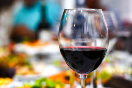 Wine glass on the background of the barの写真素材
