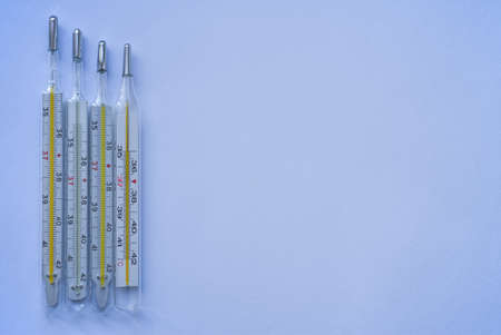 Thermometer device for measuring body temperature in case illness, isolate, copy spaceの写真素材