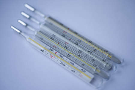 Thermometer device for measuring body temperature in case illness, isolate, copy space