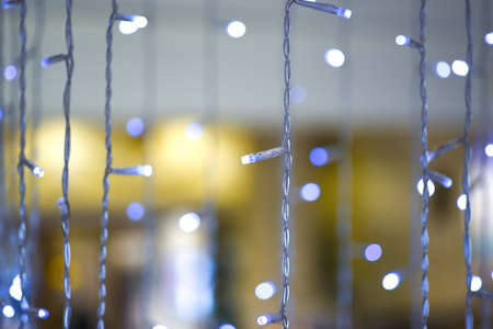 White blue electric colored garland, backgroundの写真素材