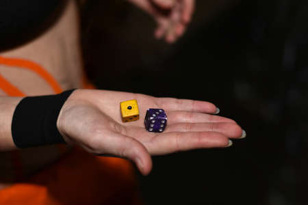 Player rolls the dice in the quest gameの写真素材