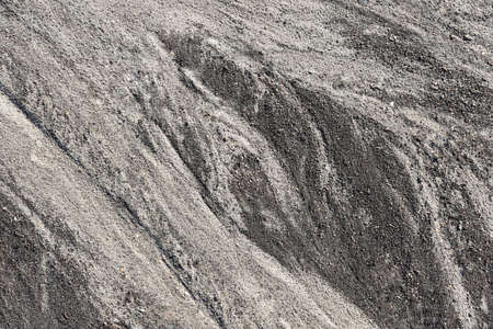 Texture erosion of black soil after washing with water.の写真素材