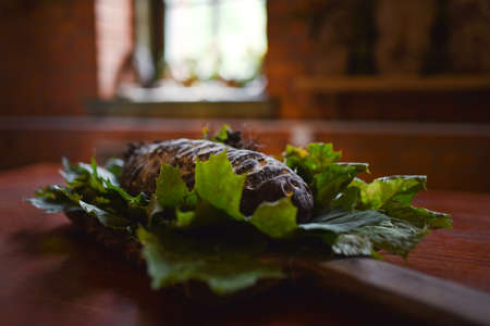 Natural black rye bread from the oven on a tray.の写真素材
