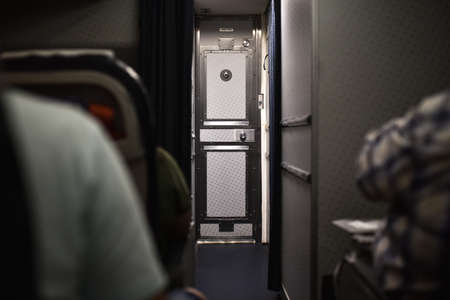 Closed cockpit door on an airplane.