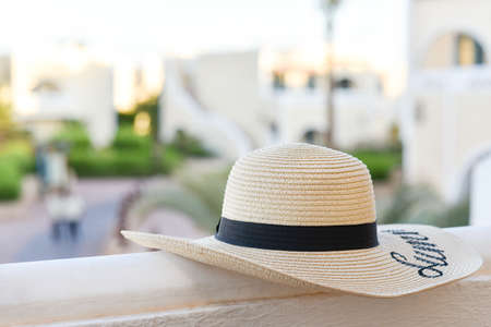 Beach hat with large brim on the balcony.の写真素材