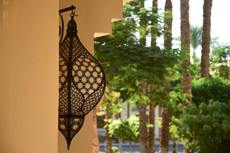 Lamps on the wall of the eastern building.の写真素材