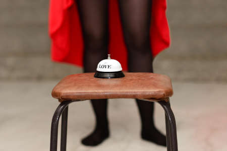 Bell to call a prostitute in a brothel.