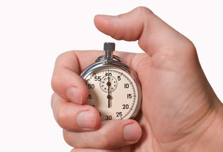 Stopwatch in hand, finger presses a button, start, finish, isolate, close-up.の写真素材