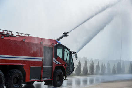 Fire truck extinguishes fire at the airport.