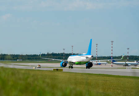Passenger plane airport runway to the dock after flights.