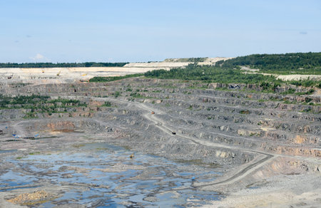 Technique works in a large mining quarry.
