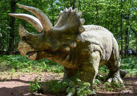 Big dinosaur mockup in the forest.の写真素材