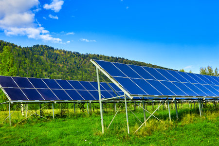 Large blue solar panels are installed in the lowlands of the mountains. An alternative source of...