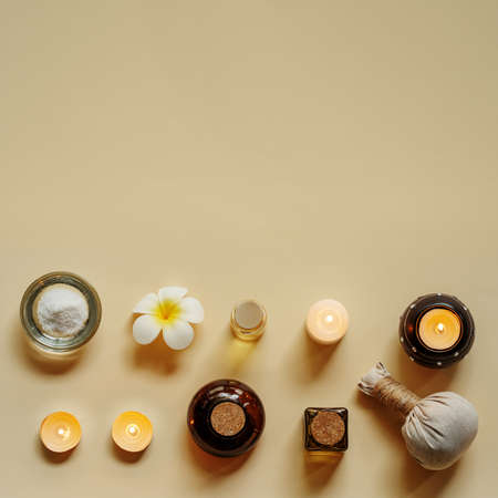 Various spa related objects on beige background, top view. Flat lay with copy space.の写真素材