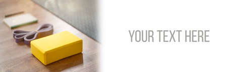 Yoga equipment composition of mat, brick, rubber band and notepadの写真素材