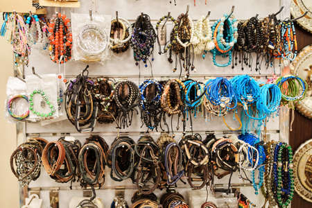 Many souvenir bracelets in the oriental storeの写真素材