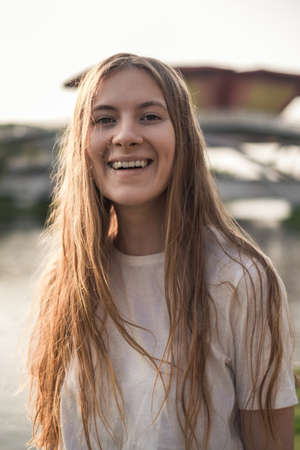Close-up portrait of attractive caucasian woman laughing. Beauty Girl without Makeup smiling....