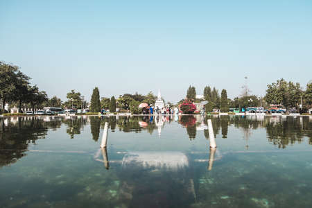 Square in the capital of Laos with fountains. Walking street with monuments and trees. High quality photoの写真素材