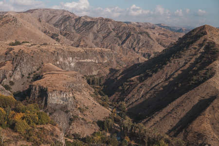 Picturesque mountain view in town in Armenia. Scenic mountain view on the sunrise in the Caucasus....