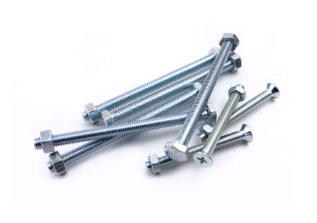 metal bolts with nuts on a white isolated background close upの写真素材