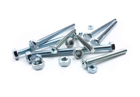 metal bolts with nuts on a white backgroundの写真素材