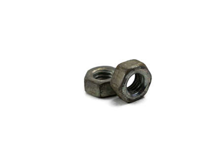 two metal nuts on a white isolated background close upの写真素材