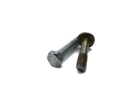 metal bolt and screw on a white isolated background close upの写真素材