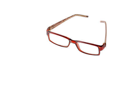 glasses for vision in brown plastic frames on a white isolated backgroundの写真素材
