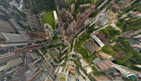 View from the air on old and new russian buildings in green area in the city with a lot of cars and skyscrapers. Russian streets, Novosibirsk.の写真素材