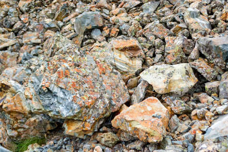 Background texture of a gray brown stone on the rock of the mountainの写真素材