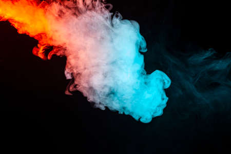 Swirling insulated colored smoke: blue, red, orange, pink; Scrolling on a black background in the...