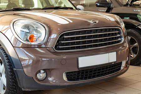 Novosibirsk, Russia - 08.01.2018: The front of the body is a polished bumper and hood with a brown...