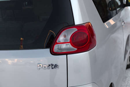 Novosibirsk, Russia - 01.19.2019: Rear lamp view on the body of a minivan Toyota Porte with with...