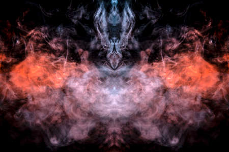 The head of a ghost on a black background from a smoke pattern of an orange-colored vape vaporizing...