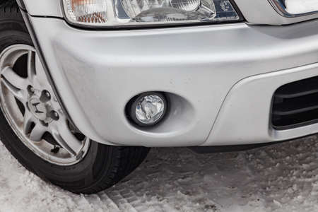 Novosibirsk, Russia - 03.10.2019: Front bumper foglamp view of Honda CR-V first generation in silver...