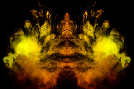 Smoke of different green, yellow, orange and red colors in the form of horror in the shape of the...