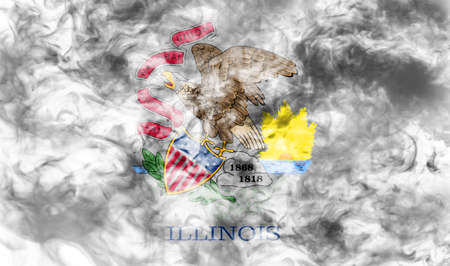 The national flag of the US state Illinois in against a gray smoke on the day of independence in different colors of blue red and yellow. Political and religious disputes, customs and delivery.の写真素材