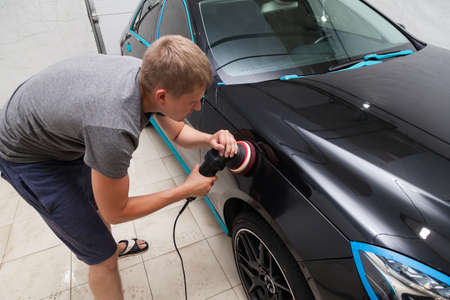 The polisher polishes the body of the vehicle with special wax to protect the car from minor...