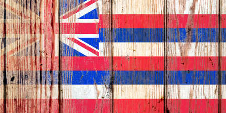 Alabama US state national flag on a gray wooden boards background on the day of independence in different colors of blue red and yellow. Political and religious disputes, customs and delivery.の写真素材