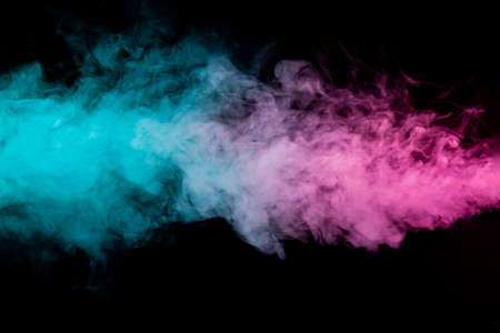 Colored background with winding clouds of smoke from patterns of different forms of pink, green and blue colors with tongues of flame on a black isolated background. Print for t-shirt.の写真素材