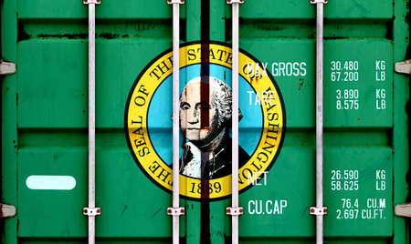 The national flag of the US state Washington in a container doors on the day of independence in...