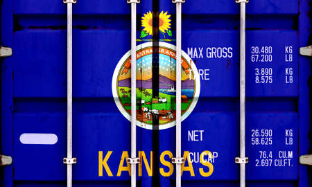 The national flag of the US state Kansas in a container doors on the day of independence in...