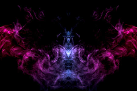 Smoke of different blue, red and pink colors in form of horror in the shape of the head, face and...