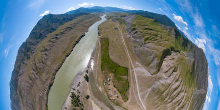 Aerial view of planet earth with the image of nature and picturesque landscapes near a mountain with...