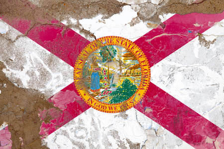 Florida grunge, damaged, scratch, old style state flag on wall.の写真素材