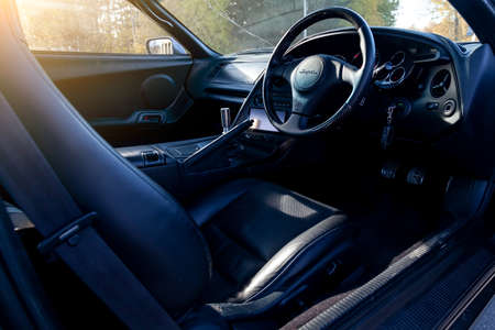 Novosibirsk, Russia - 10.09.2019: Interior of a rare Japanese sports car in the back of a gray...