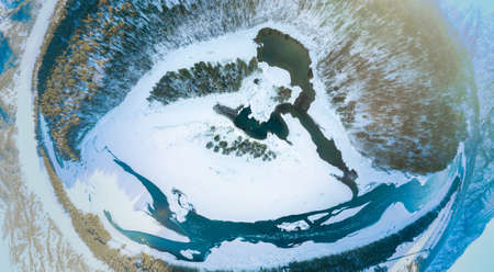 Aerial view of the blue lakes in the Altai mountains that appear only in winter and freeze under ice...