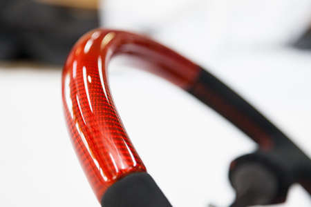 The disassembled steering part before installation of the equipment is a carbon alutex fibre orange...